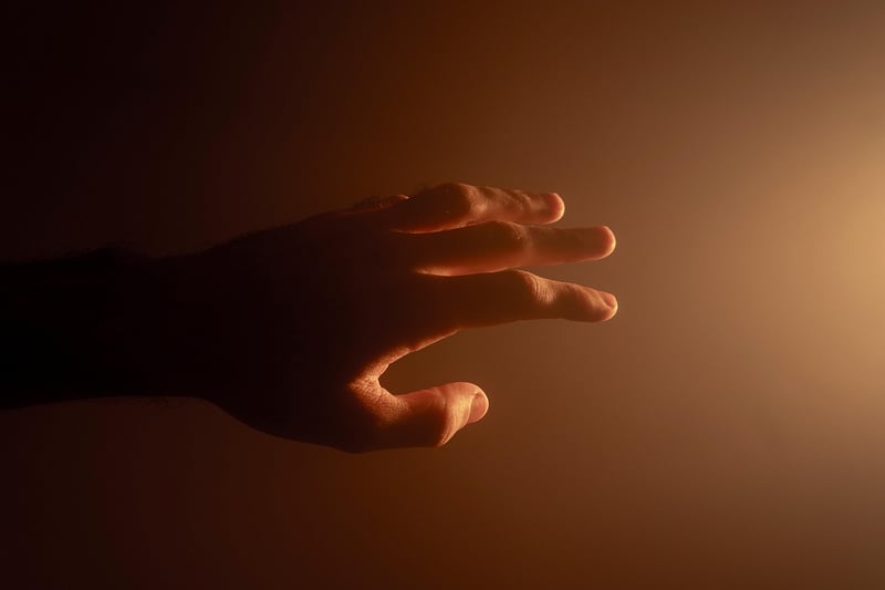 Surreal hand reaching out